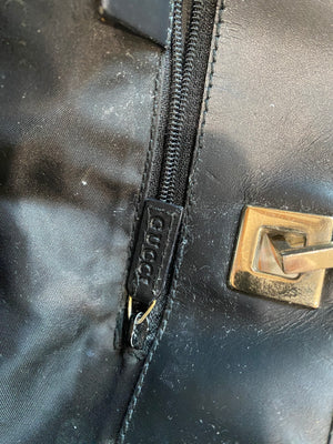 Gucci 2000s Black Monogram Small Pouch Bag · INTO